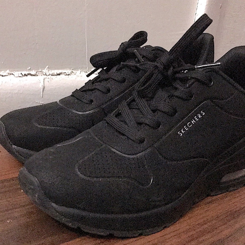 Women Skechers in Black.